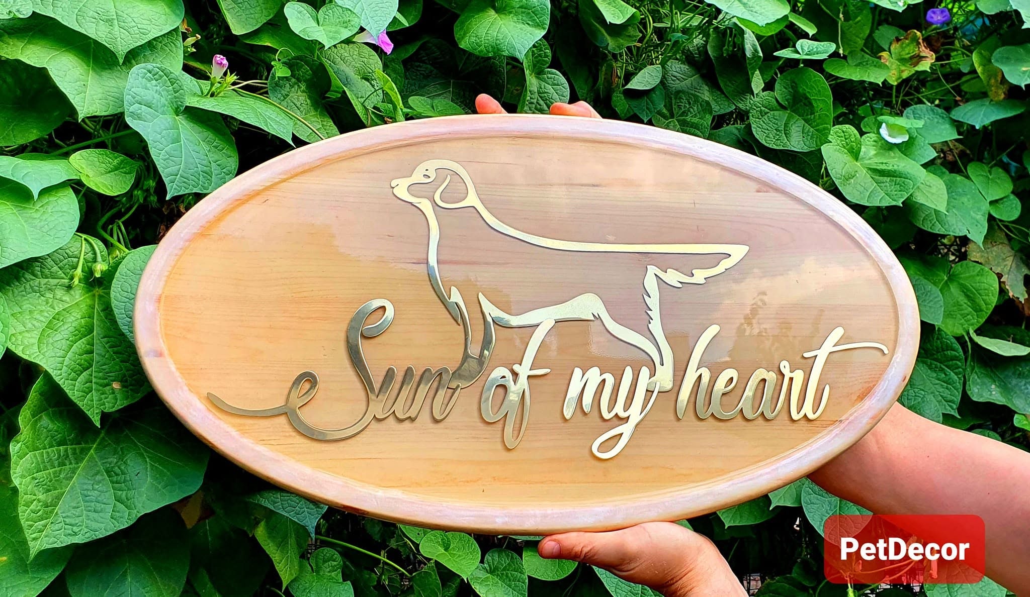 Full view of the Sun of My Heart dog silhouette panel against greenery